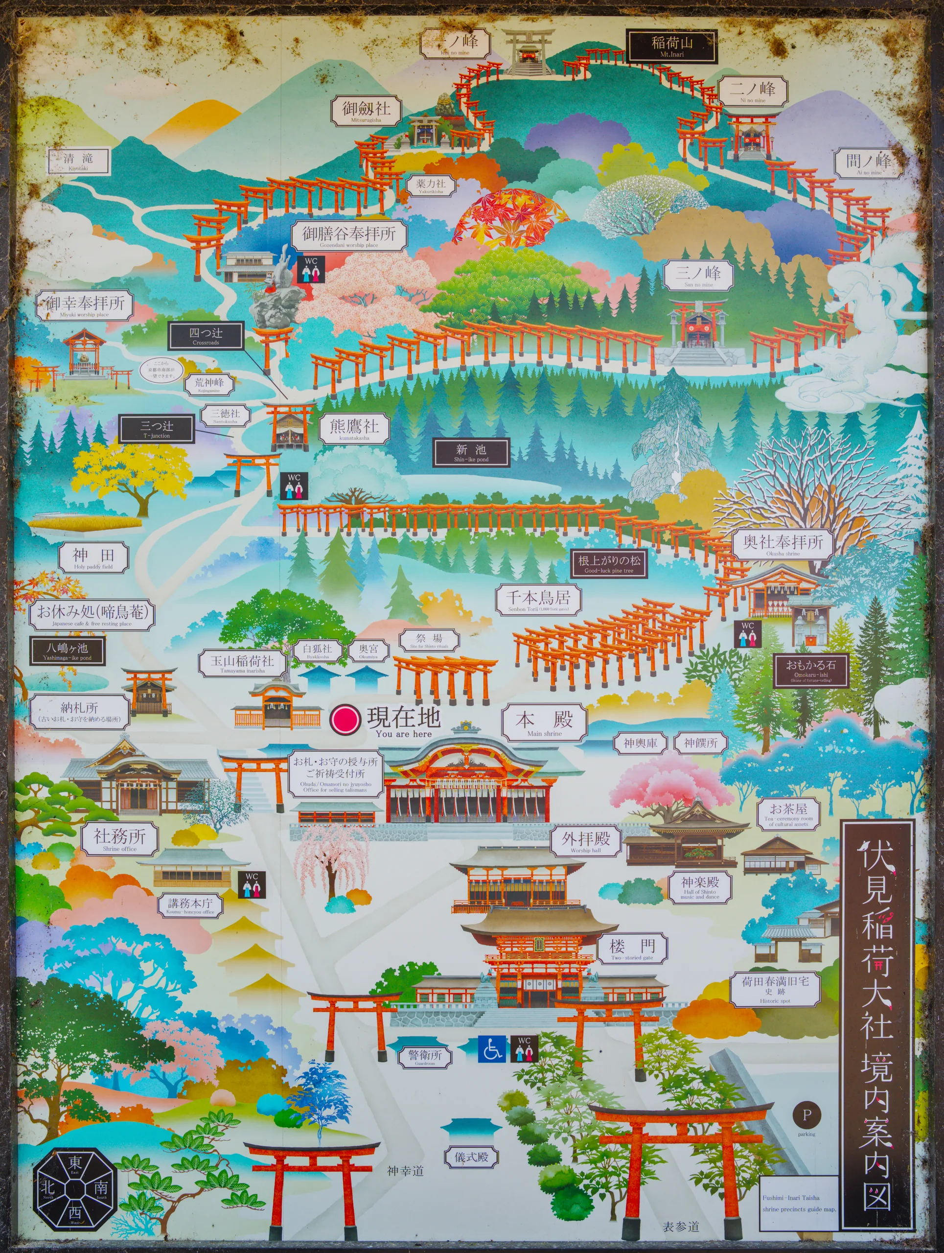 An illustrated map showing a Japanese landscape with mountains, rivers, temple buildings with red roofs, and Japanese text labels.